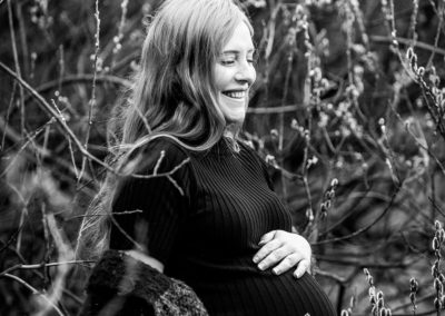 Maternity photographer in Barnsley, mum laughing black and white image
