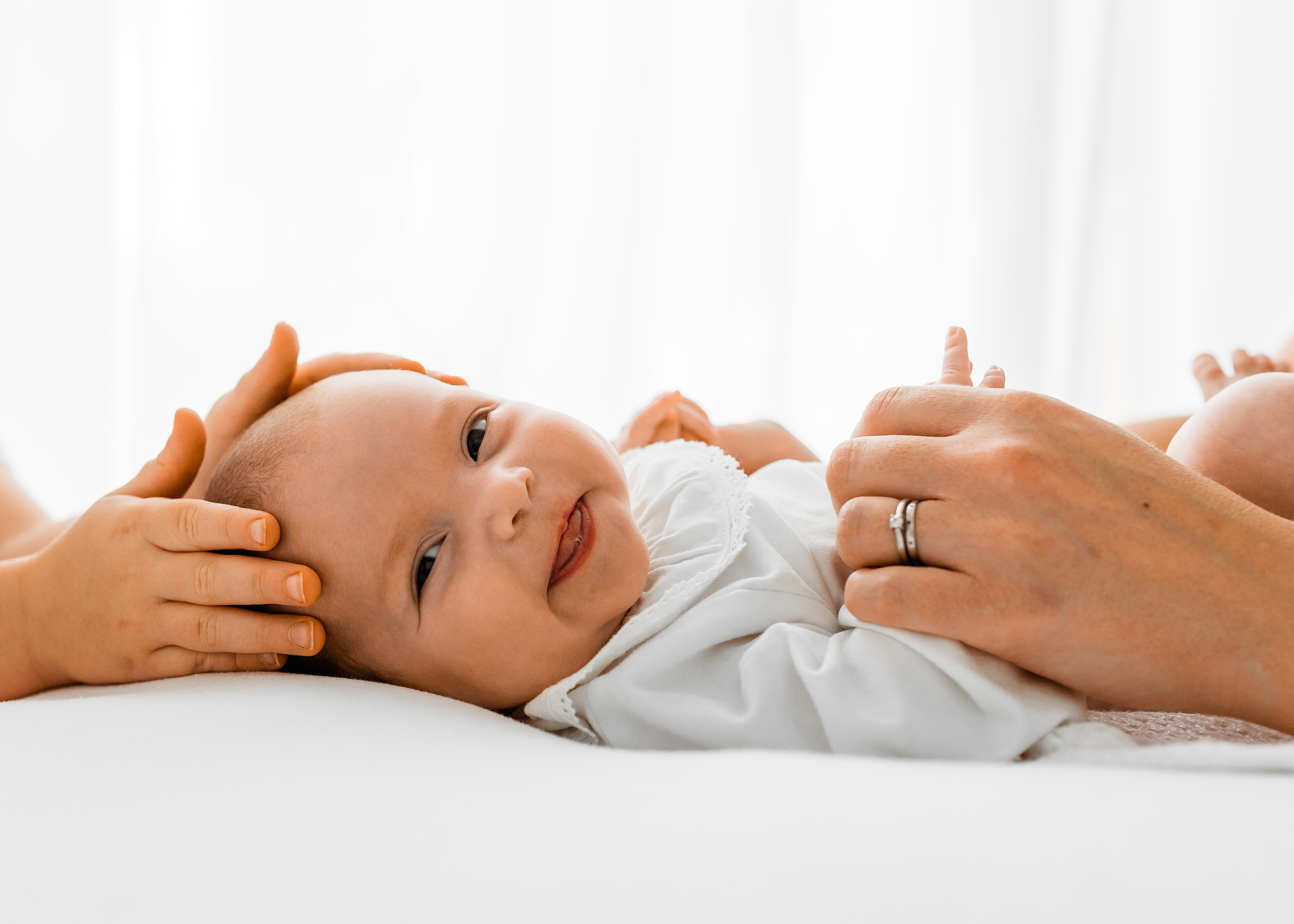 older newborn photography session, baby smiling at camera
