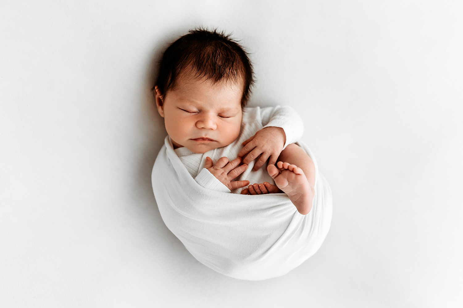 baby wrapped a sleep newborn photographer Barnsley 
