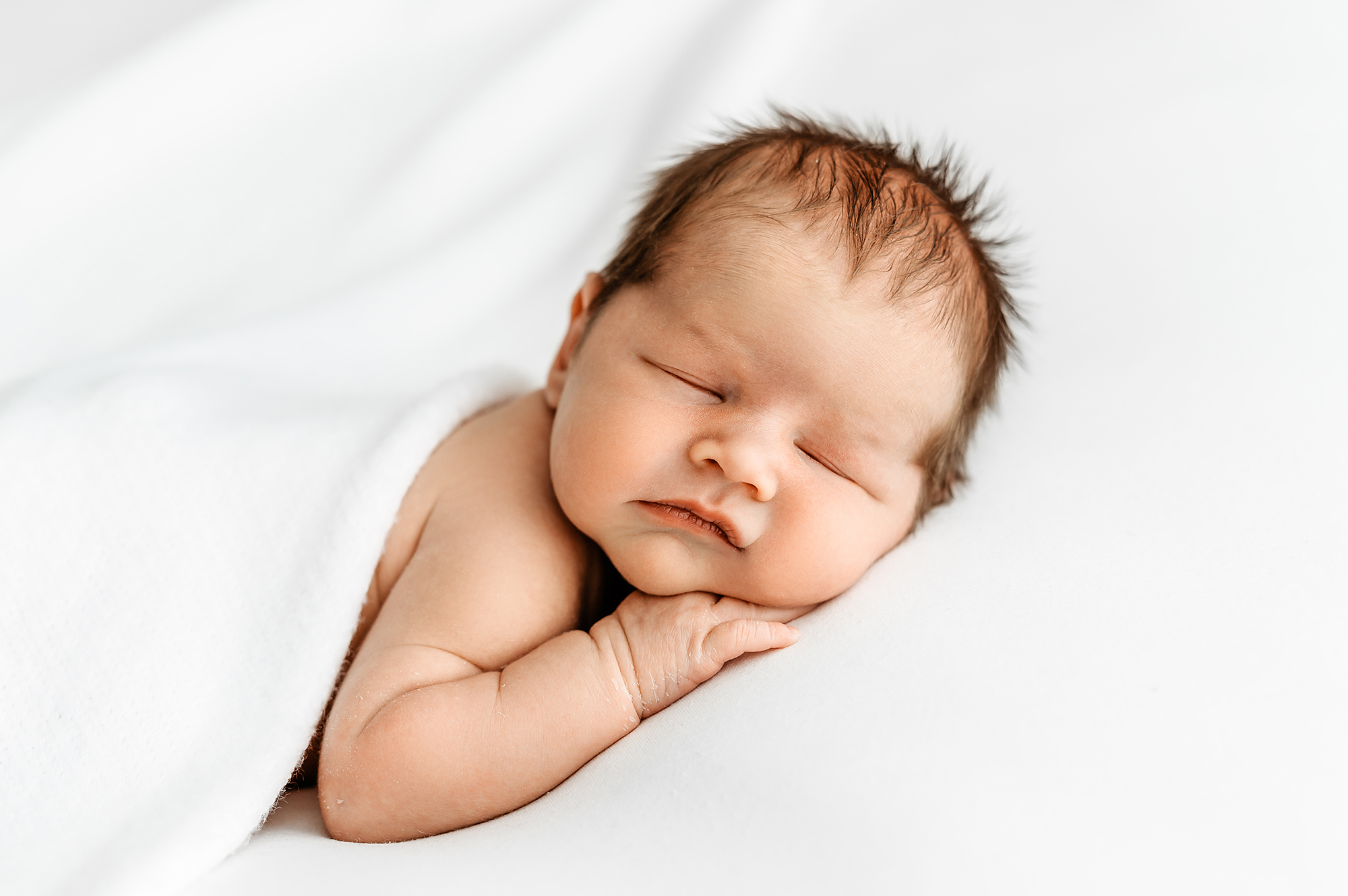 how to choose a newborn photographer, baby sleeping on tummy 