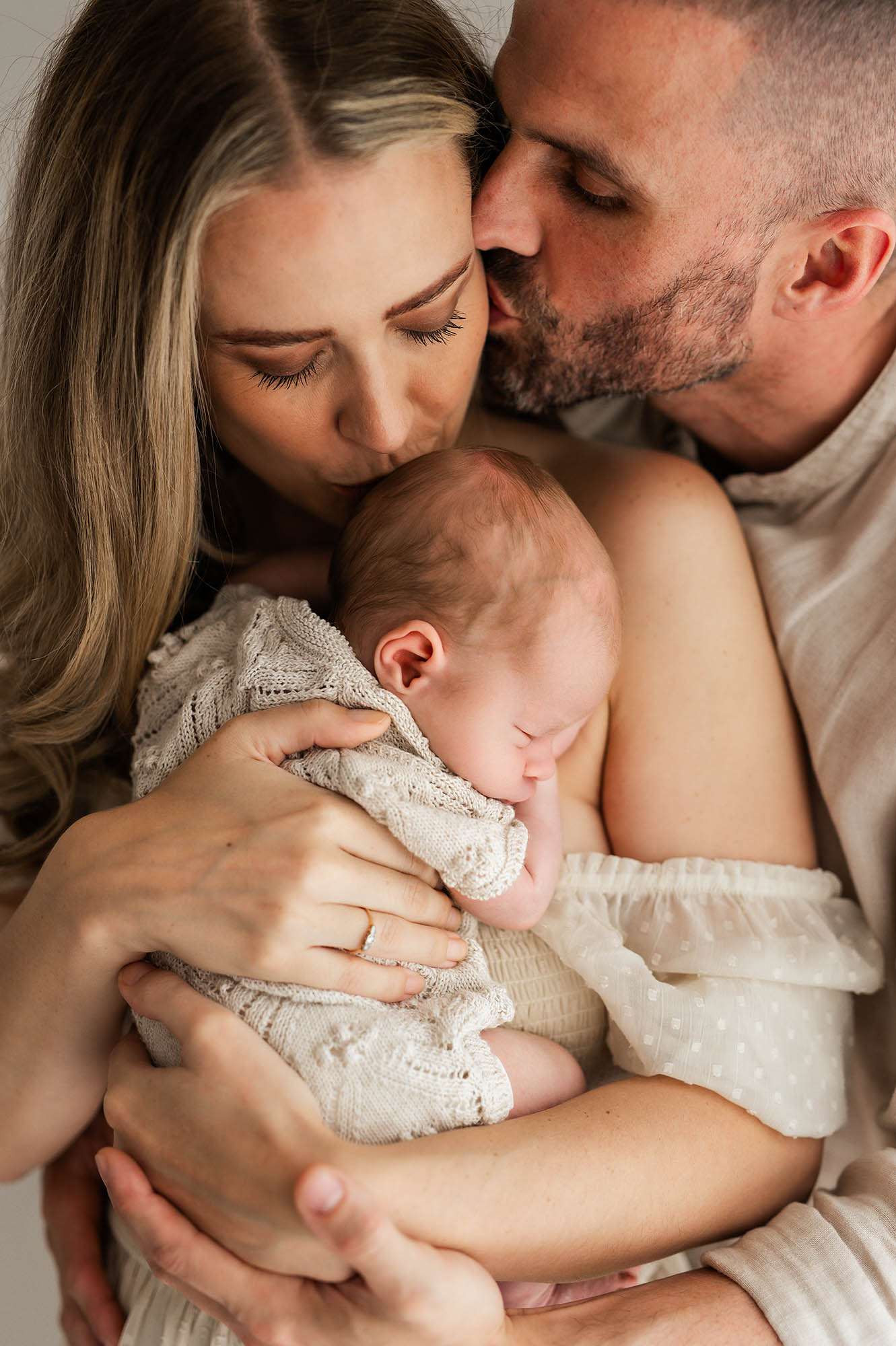 A warm photo of parents with their newborn, Barnsley photographer, Yorkshire